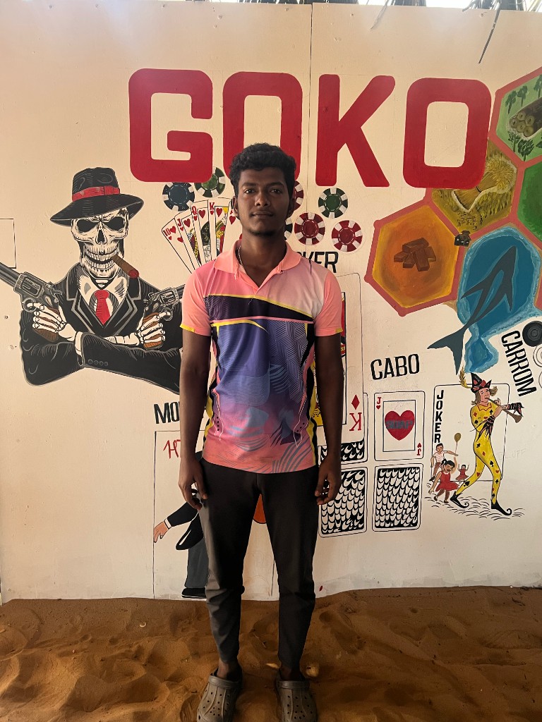 Bhaskar in front of the GOKO mural