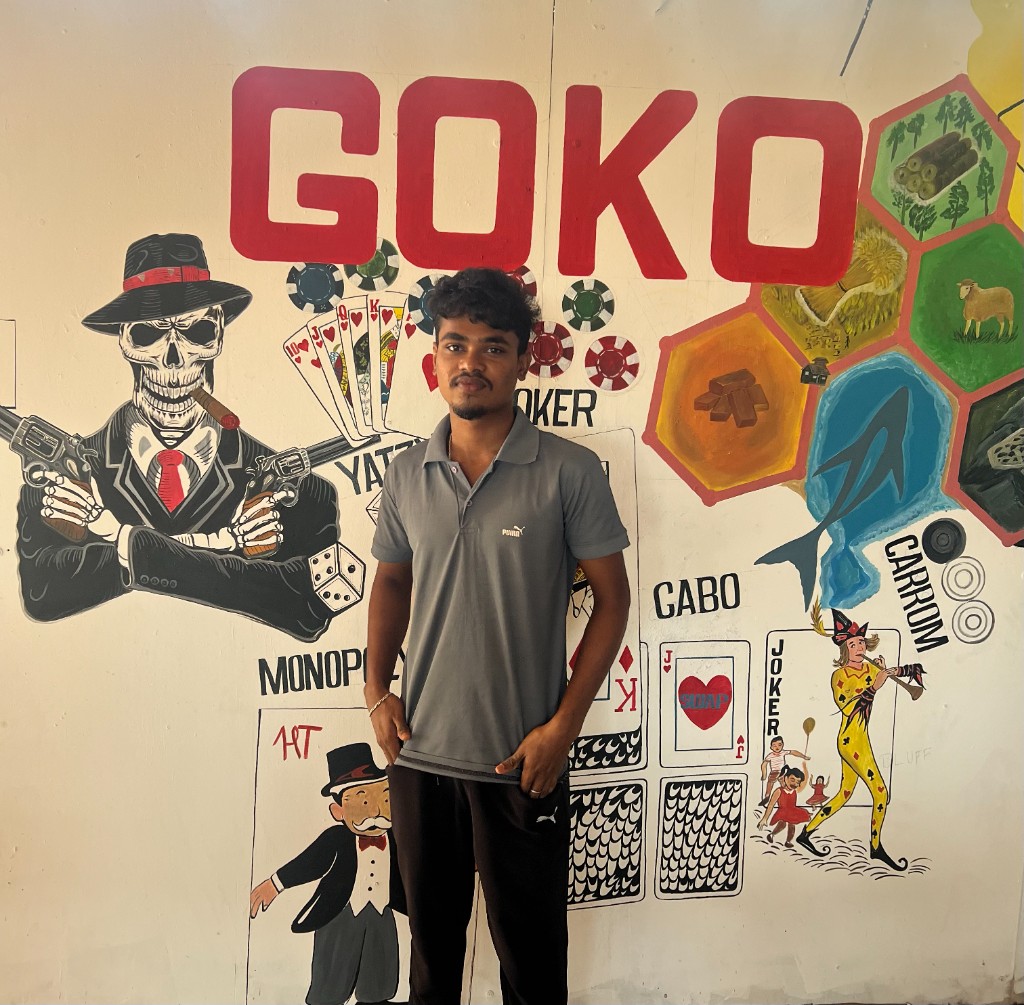 Dilip in front of the GOKO games mural